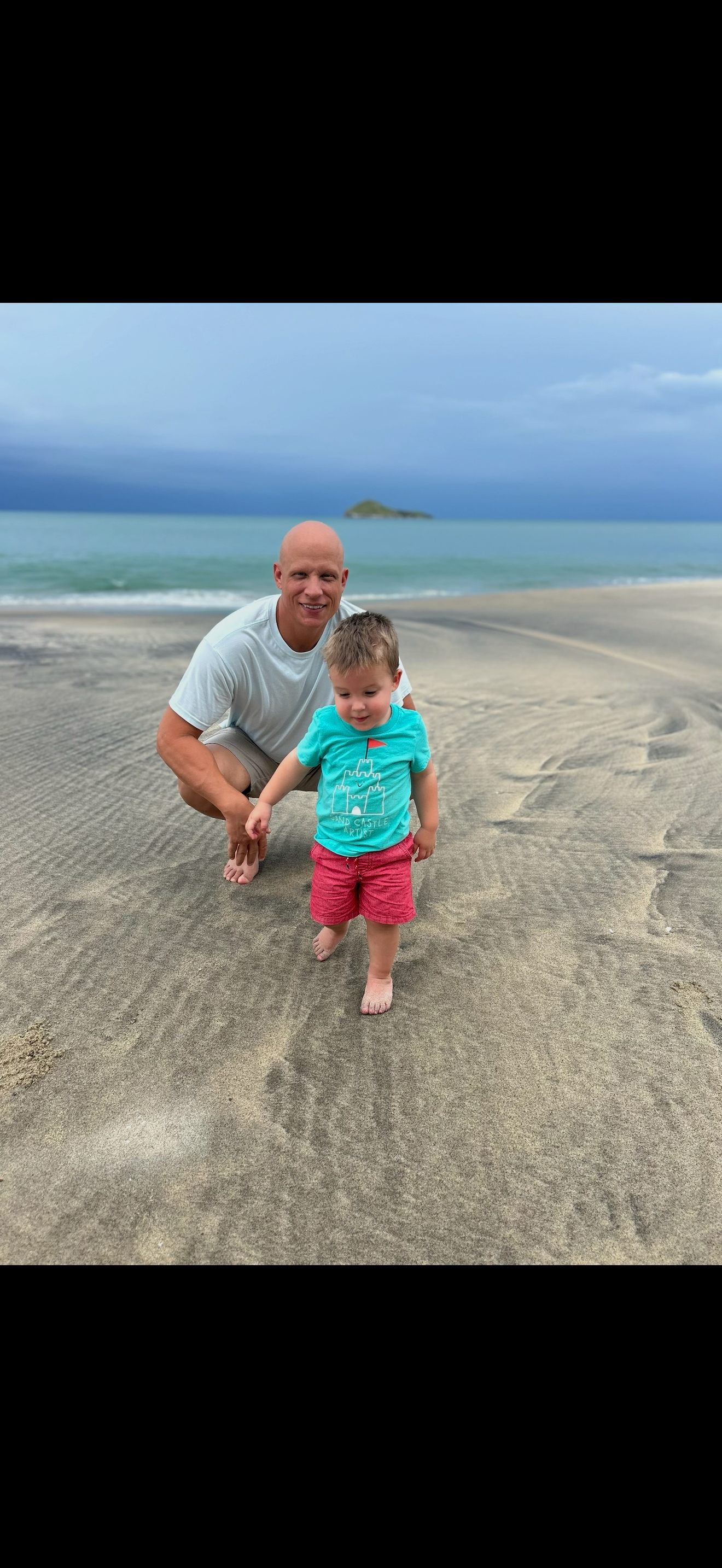 Brian at the beach with his son